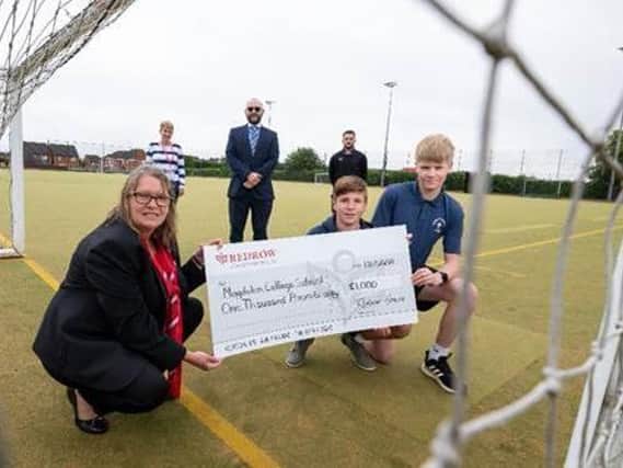 Redrow South Midlands has presented Magdalen College School in Brackley with a donation of £1000 as part of its community fund initiative. (submitted photo)
