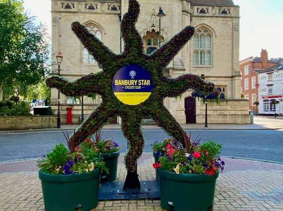 A floral display has been erected outside Banbury Town hall to help mark 130 anniversary of Banbury Star Cycling Club. (Photo from Banbury Star Cycling Club)