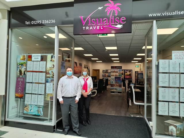 Darrell Evans, the owner of Visualise Travel, with a colleague inside the Castle Quay Shopping Centre in the Banbury town centre is ready to help plan your next big holiday