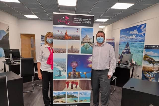 Darrell Evans, the owner of Visualise Travel, with a colleague inside the Castle Quay Shopping Centre in the Banbury town centre is ready to help plan your next big holiday