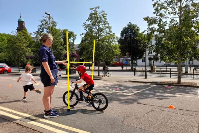 Child cycling at the Cherwell District and Oxfordshire County Council route reveal event for the Women's Tour Cycling race held today (Wednesday July 21) near the Banbury Cross in town