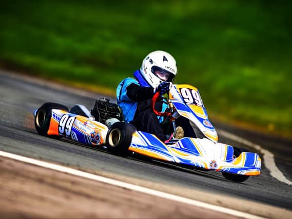 A Kingham Hill School driver in karting action