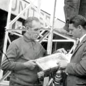 On the left, former West Ham United, Chelsea and England forward Len Goulden, then manager of Banbury United overseeing the installation in 1966
