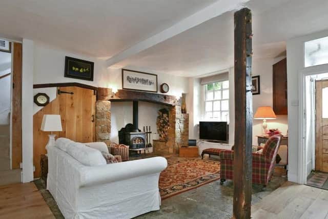The living room of the home up for sale on the Bull Ring in the centre of Deddington (Image from Rightmove)