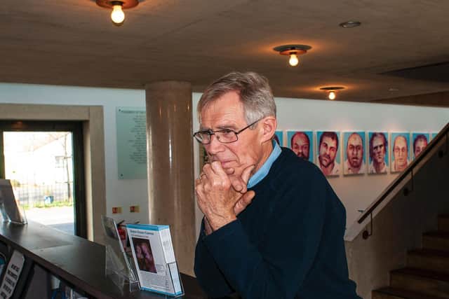 Dr Roger Shapley at an exhibition of his work - including the portraits in pastels - in Oxford