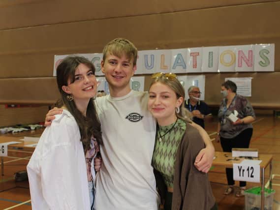 Chenderit School students, Maisie Clark George Wood and Grace Hall, collect their A-level results on Tuesday August 10 (Image from Chenderit School)