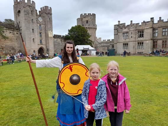 Hope and Eowyn Elofson meet Æthelflæd, who was played by an actress who stopped to talk to us and share her story as the daughter of King Alfred the Great, who founded the town of Warwick