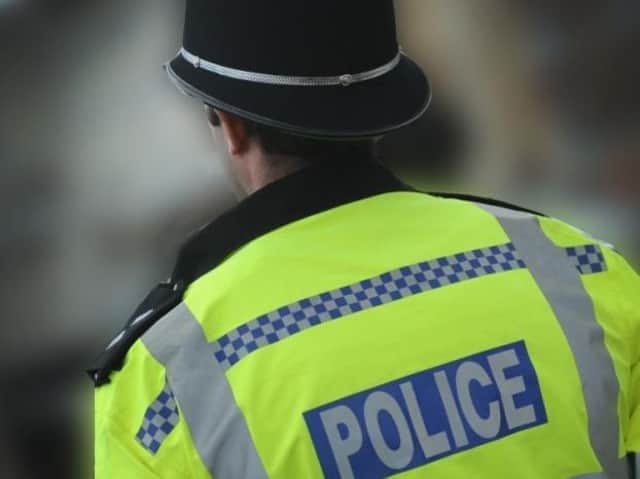 Police are trying to identify the body of a woman found in a lake in south Cherwell