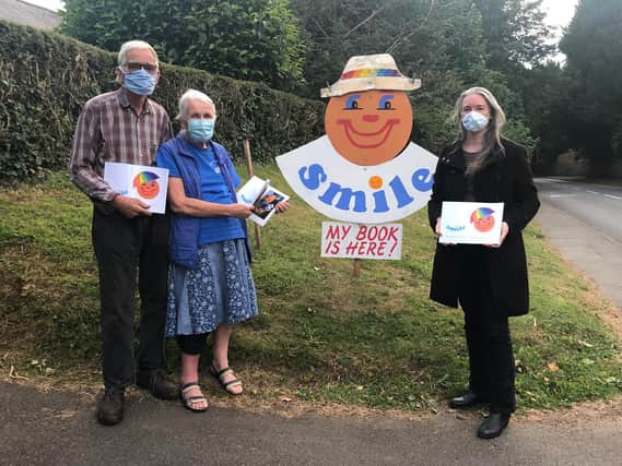 Chris Wells and husband Brian, left, have been entertaining Middleton villagers with their Banksie feature. Right is daughter Kate Spencer who is marketing the Banksie book