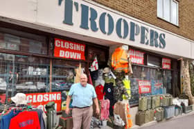 Mike Dean stands outside his business - Troopers - which is closing after nearly 40 years of business