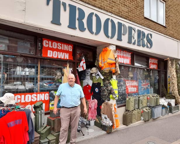 Mike Dean stands outside his business - Troopers - which is closing after nearly 40 years of business