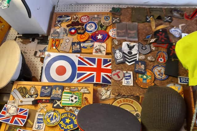 Military badges and collectables sold at Troopers in the Banbury, which is closing after nearly 40 years in the town centre.
