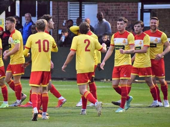 Celebrations for one of Henry Landers’ goals at AFC Rushden & Diamonds last week - and he was on the scoresheet again against Barwell on Saturday PICTURE BY JULIE HAWKINS