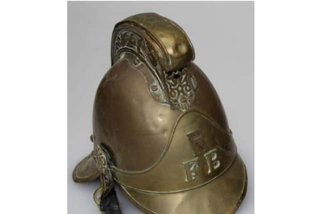 Edwardian brass fireman’s helmet which sold for £460. (Image from Hansons)