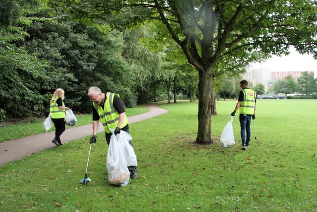 Keter staff get to work collecting rubbish from Spiceball Park as part of their Community Connection initiative