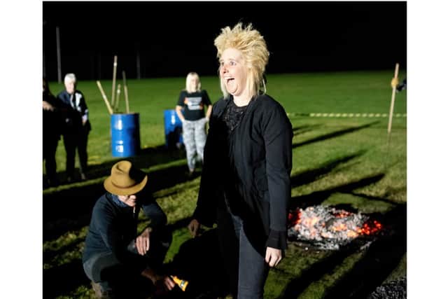 An excited woman taking part in the firewalking event to help Katharine House Hospice (photo by Neil Simmons with Modern Parlances Photos)