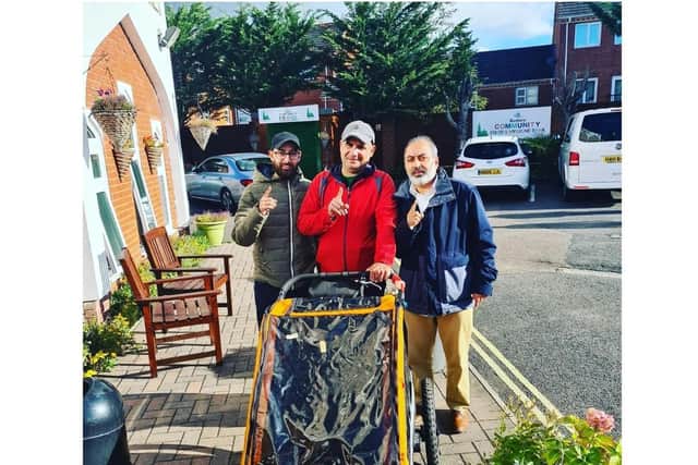 Cancer survivor, Farid Feyadi, who has started a massive 15,000-mile walking trek from Birmingham to China experiences acts of kindness during stops in Shipton and Banbury this week. (Pictured outside the Banbury Mosque)