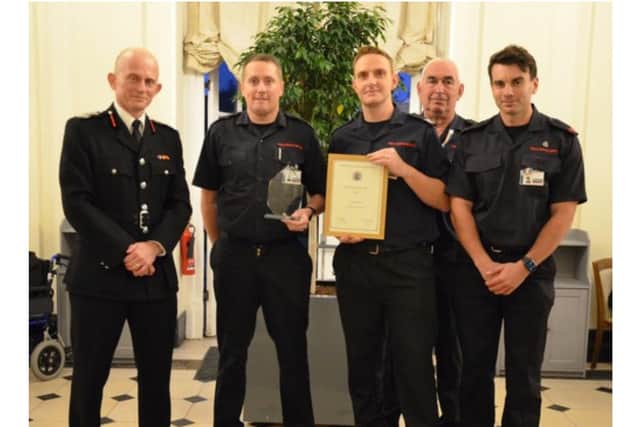 Rob MacDougall, Oxfordshire County Council’s Fire and Rescue Service’s Chief Fire Officer, and the four Banbury firefighters recognised - Martin Cowley, Mark O’Connor, Anthony Lampitt and Tom Northcote. (photo from Oxfordshire County Council)
