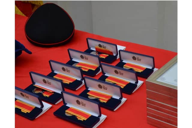 Medals received by firefighters with Oxfordshire Fire & Rescue Service, including four from Banbury Fire Station (Image from Oxfordshire County Council)
