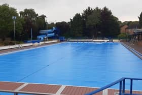 The new covers on the open air pool help to keep heat in and prevent debris falling into the water