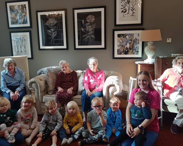 Children from the Little Sparrow Nursery Kids with residents of Glebefields CareHome in Drayton.