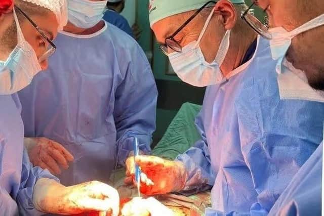 Prof Nick Maynard operating on a patient in one of the remaining hospitals in Gaza