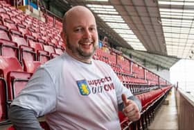 Aston Villa super fan becomes the first person to sit in every seat at Villa Park during sitathon challenge.