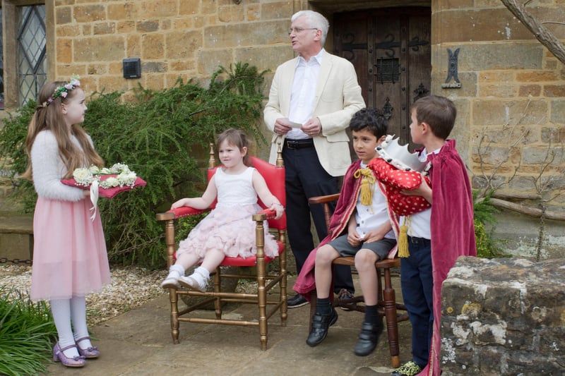 As tradition dictates a boy and girl from the local primary school are crowned May Day king and queen.