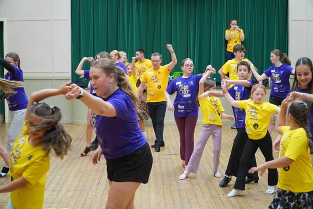 The young dancers are being put through their paces by experienced performers from the Joanne Banham Dance Company.