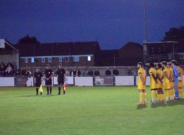 The Banbury United players paid their respects to Her Majesty Queen Elizabeth II ahead of their 3-2 defeat at Peterborough Sports. Picture by Julie Hawkins