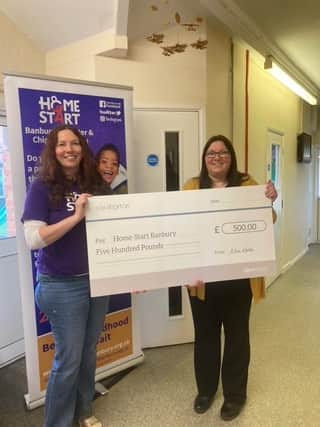 Fundraising and communications officer at Home-Start, Naomi Hunt receives the cheque from Nara Norton manager Julie Clarke.