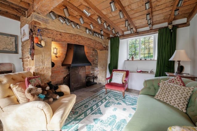 There is a snug which also has an inglenook fireplace, and windows to the front and rear.