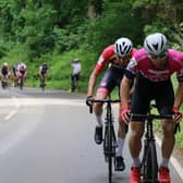 Road race riders on the grind up Edge Hill