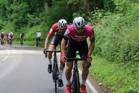Road race riders on the grind up Edge Hill