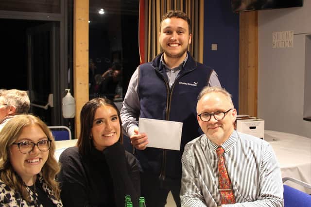 Dementia Active's quiz night overall winners were accountants Whitley Stimpson.