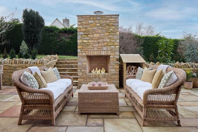 A patio area outside the house would be a wonderful place to entertain in the summer