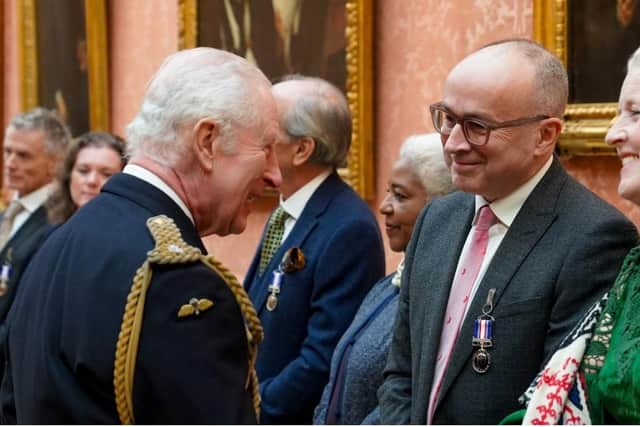 Prof Nick Maynard receiving one of the first-ever Humanitarian Medals by King Charles III at Buckingham Palace in 2025