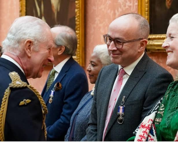 Prof Nick Maynard receiving one of the first-ever Humanitarian Medals by King Charles III at Buckingham Palace in 2025