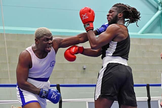 Tobi Lawal from Finchley beating Mark Ahondjo of Leicester Unity to secure the gold medal in the senior super-heavyweight division.