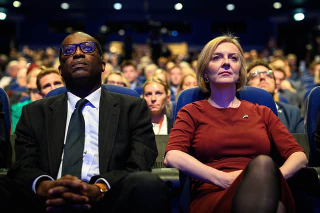 The former Chancellor of the Exchequer Kwasi Kwarteng (L) and former Prime Minister Liz Truss. PIC Leon Neal/Getty Images