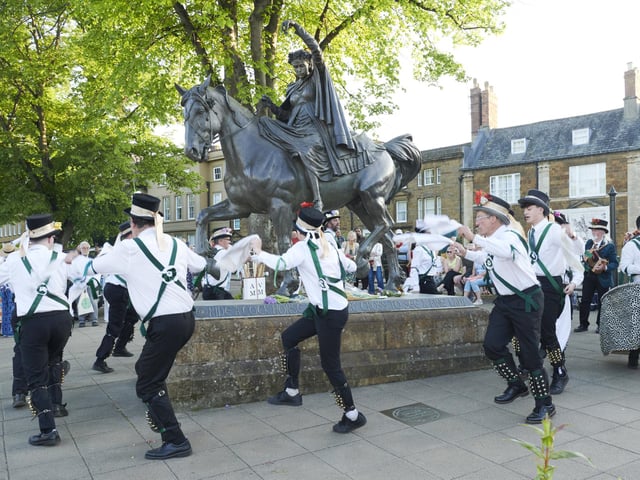 Adderbury Village Morris Men dancing around the statue on Wednesday, April 30.