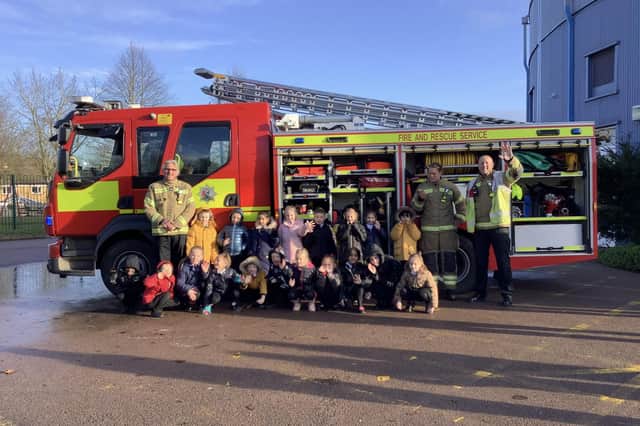 The year 2 pupils alongside the special visitors from North Oxfordshire Fire and Rescue