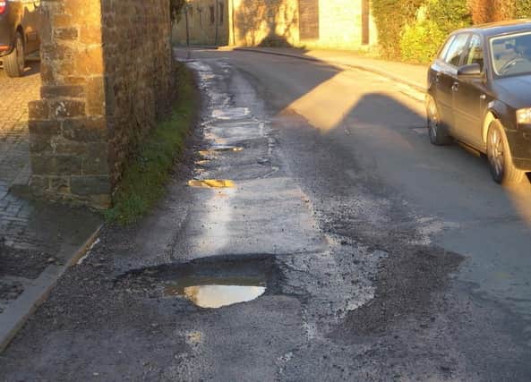 The monster pothole that is causing disturbance to residents as motorists crash over it