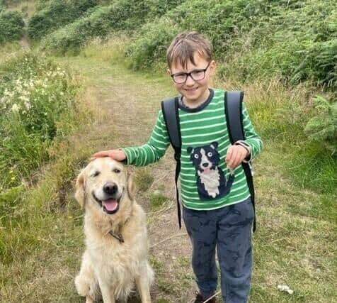 Freddie with his dog Herbie on a summer holiday walk