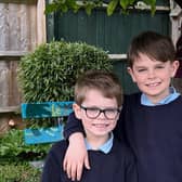 Dylan and Caleb Thompson, who were inspired by David Attenborough's Wild Isles programme to ask for wild flowers to be grown on Orchard Way