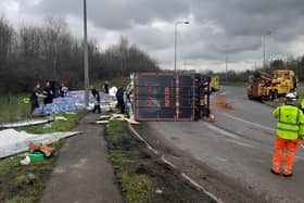 Emergency services are currently at the scene of the where a lorry has overturned at Junction 10 of the M40.