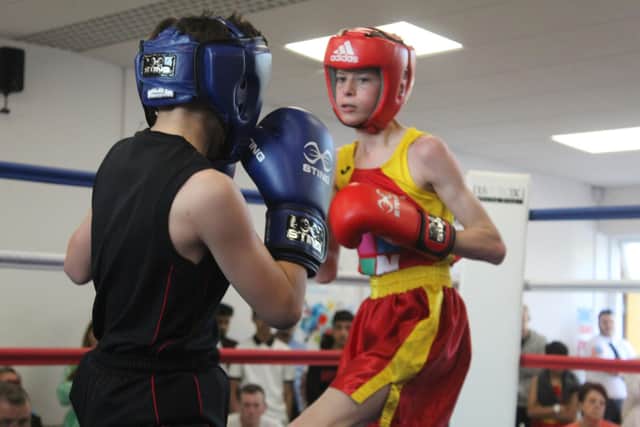 Banbury Boxing Club's Jake Derechter (red) v Martin McDonagh of Bicester ABC