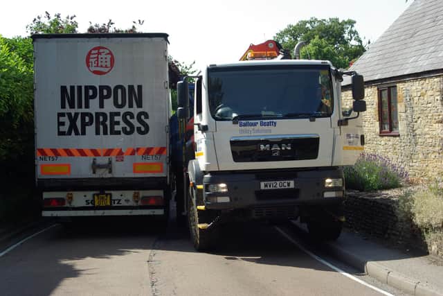 Lorries struggling to get past each other on the A422 in Farthinghoe