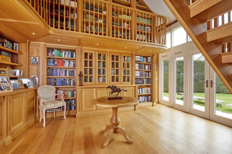 As one would expect, the bespoke Heaven and Stubbs-fitted bookshelves and furniture of the library are the selling point of the house.