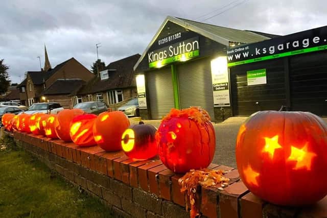 Last year's fantastic display of decorated pumpkins outside of Kings Sutton Garage.
